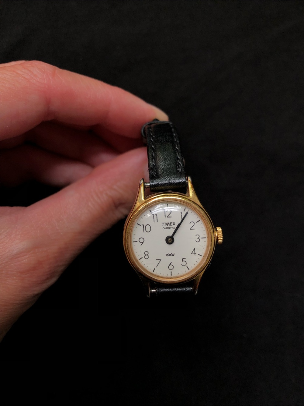 Timex Gold-Tone Wrist Watch with Black Leather Band. Womens